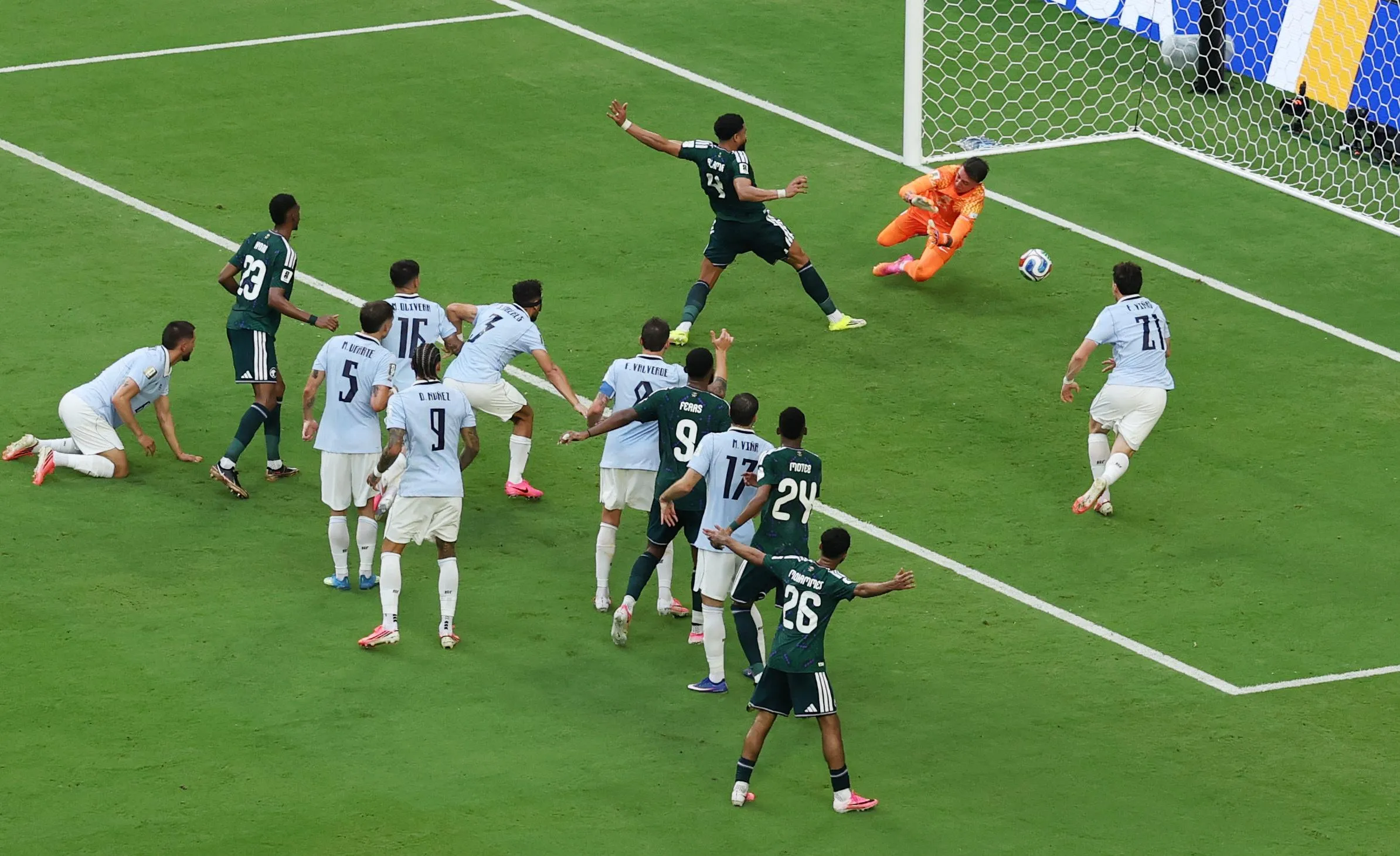 Saudi Arabia’s Abdulelah al-Amri pokes home to open the scoring