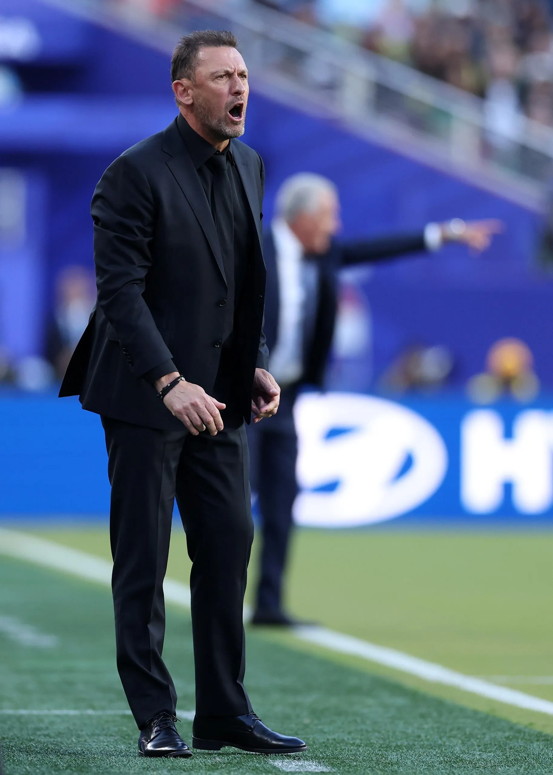 Tony Popovic, Head Coach of Australia, reacts.