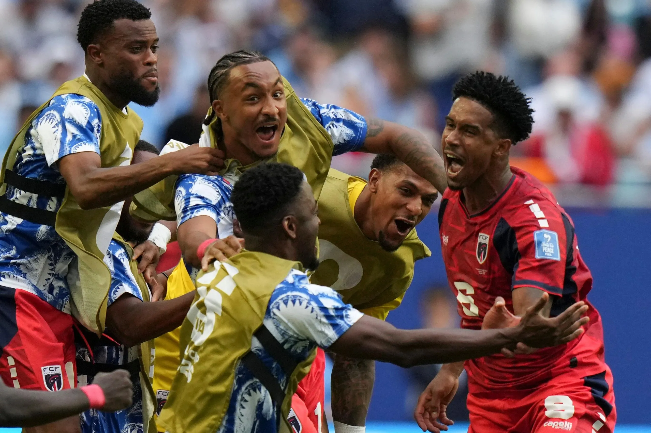 Cape Verde's Kevin Pina celebrates with teammates after scoring the opening goal.