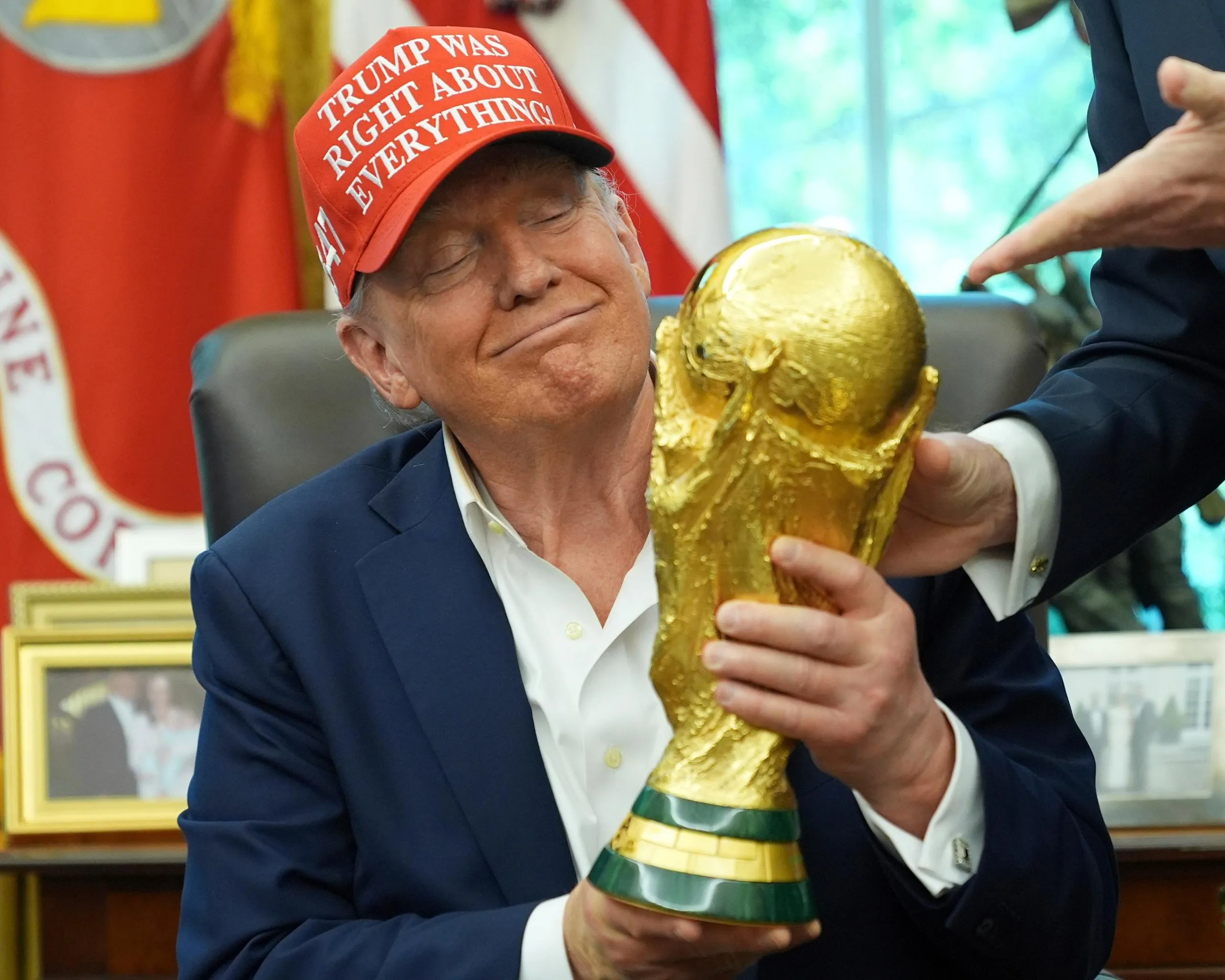 Donald Trump with the World Cup trophy last year