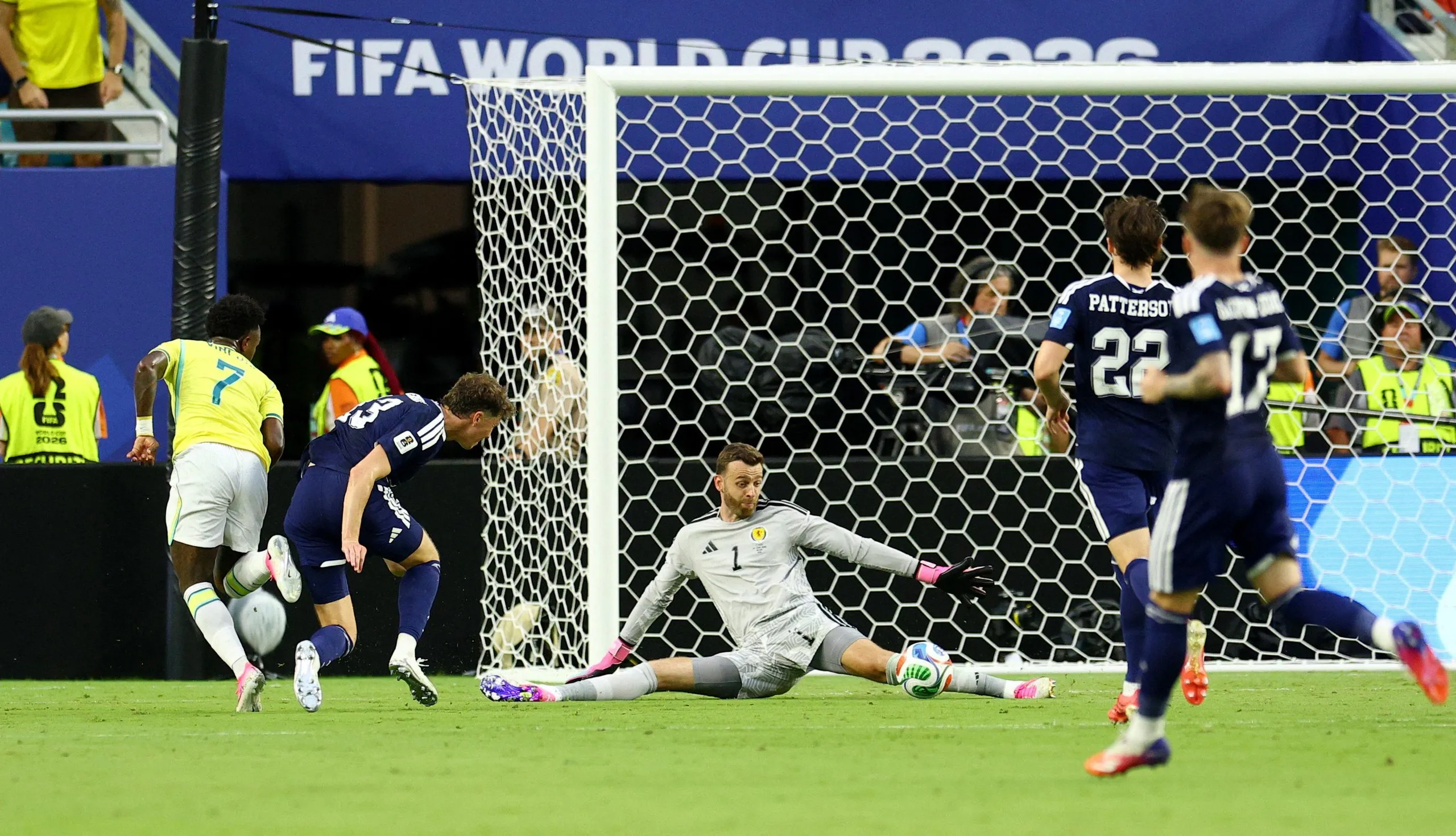 Vinicius Junior has his shot saved by Angus Gunn.