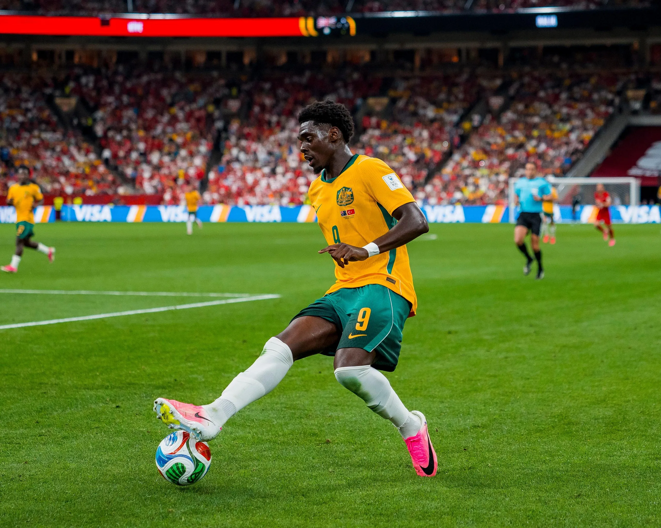 Socceroos striker Mo Touré controls the ball during a World Cup match against Turkey