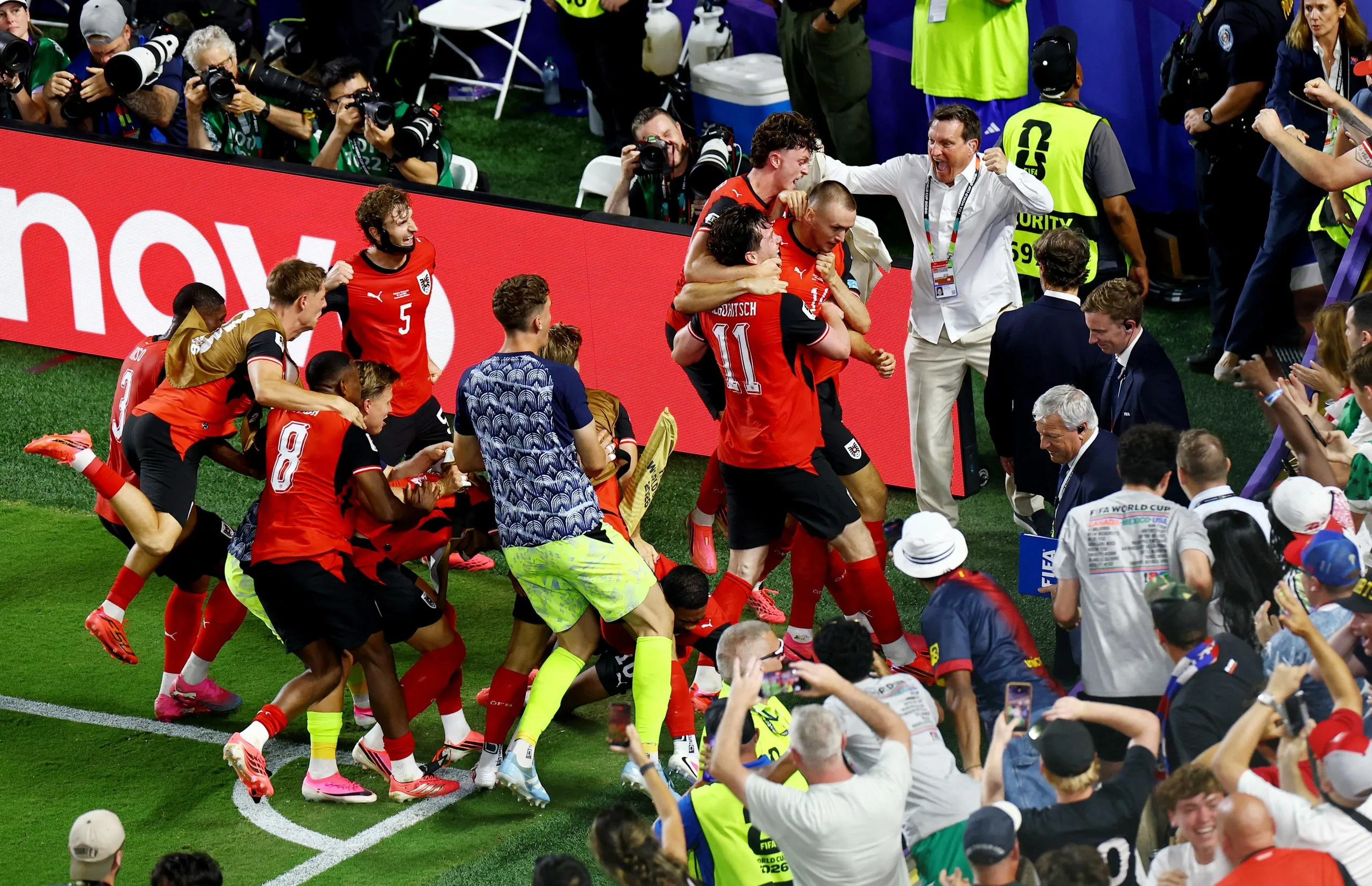Austria's Sasa Kalajdzic celebrates scoring their third goal with teammates
