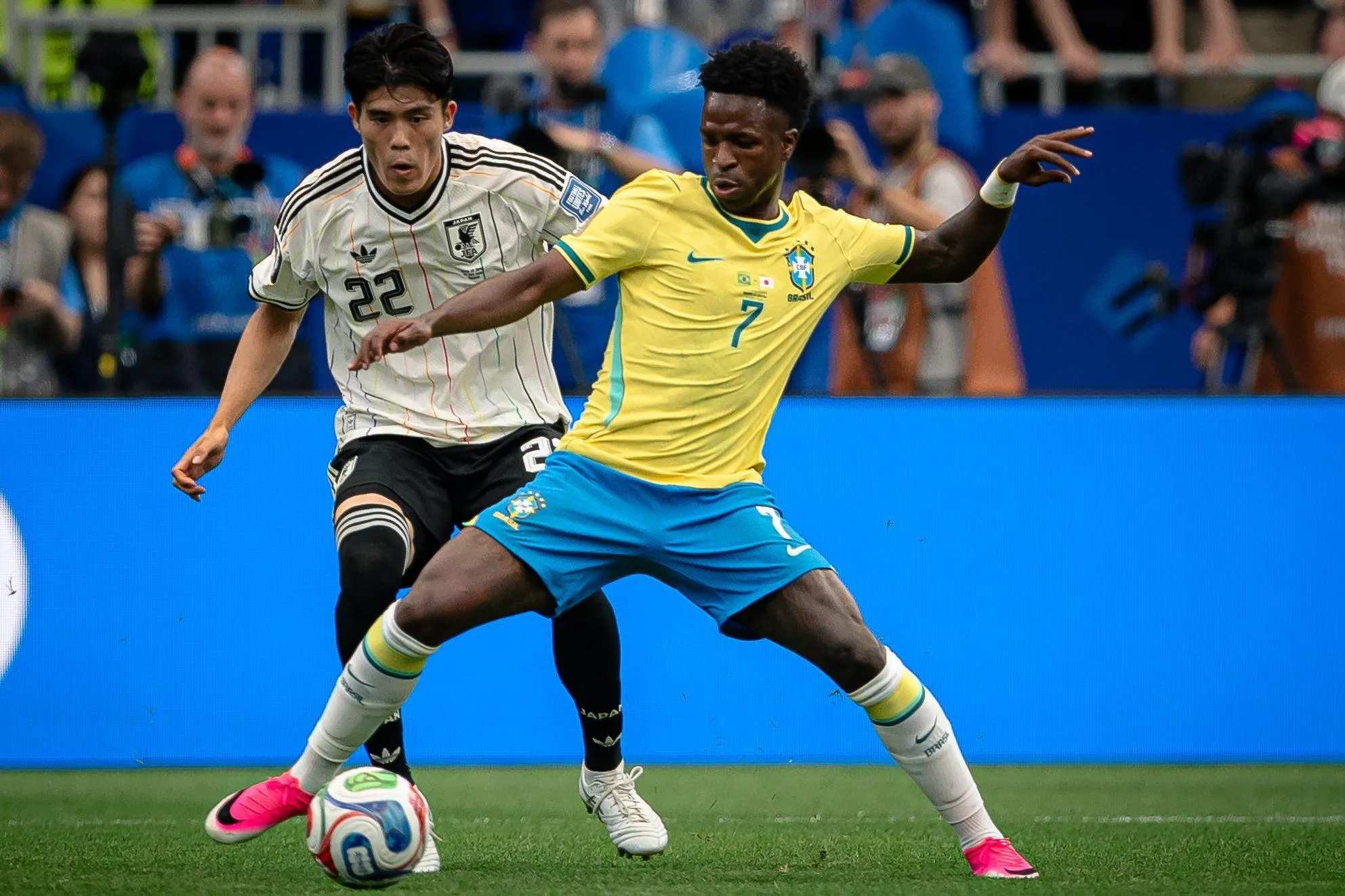 Popular Greek waiter Takehiro Tomiyasu takes on Vinícius Jr during this summer’s World Cup