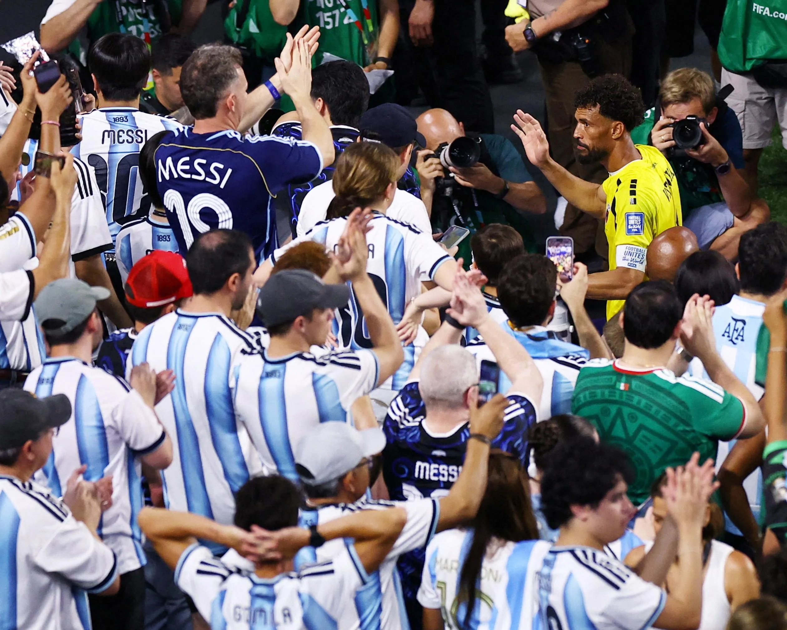 Argentina fans applaud Cape Verde’s Vozinha after the match
