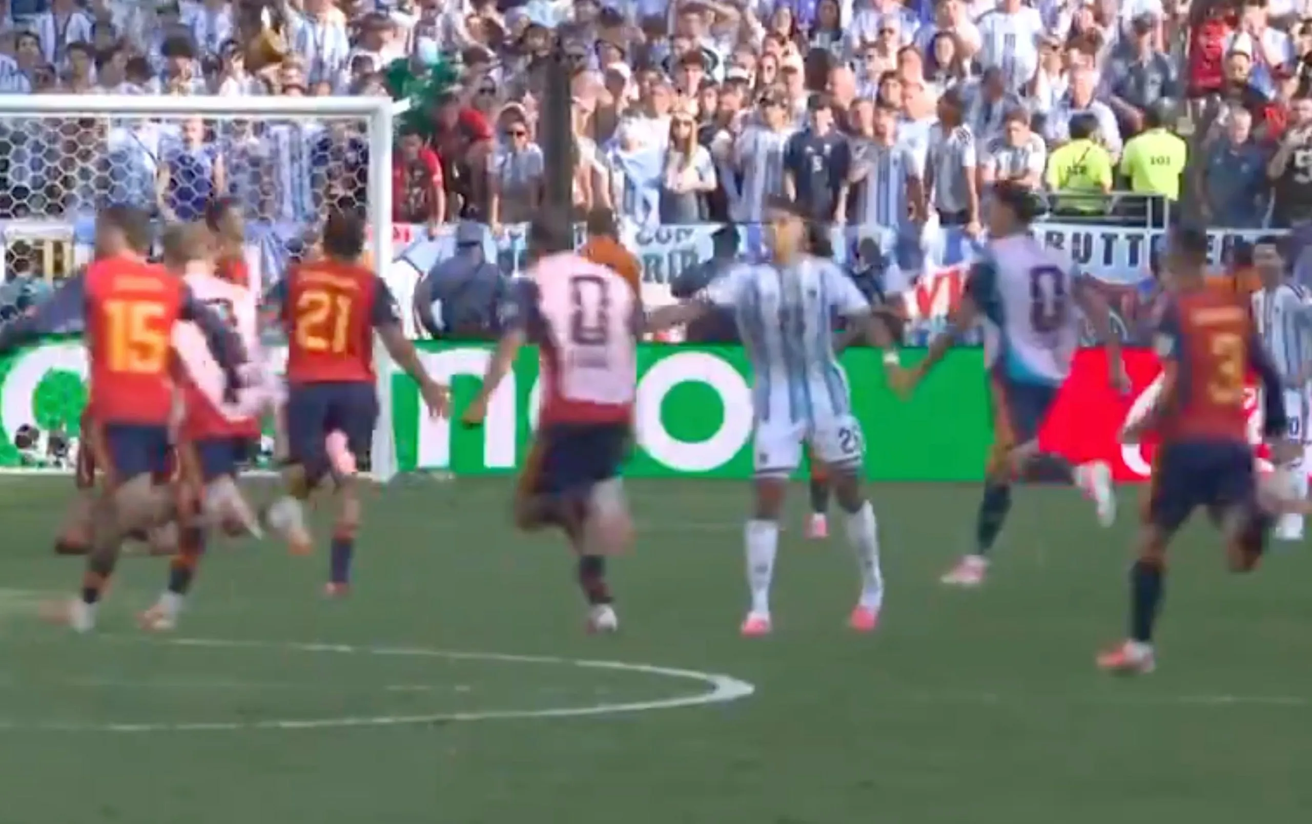 Argentina’s Nahuel Molina takes a swing at Spain’s Rodri