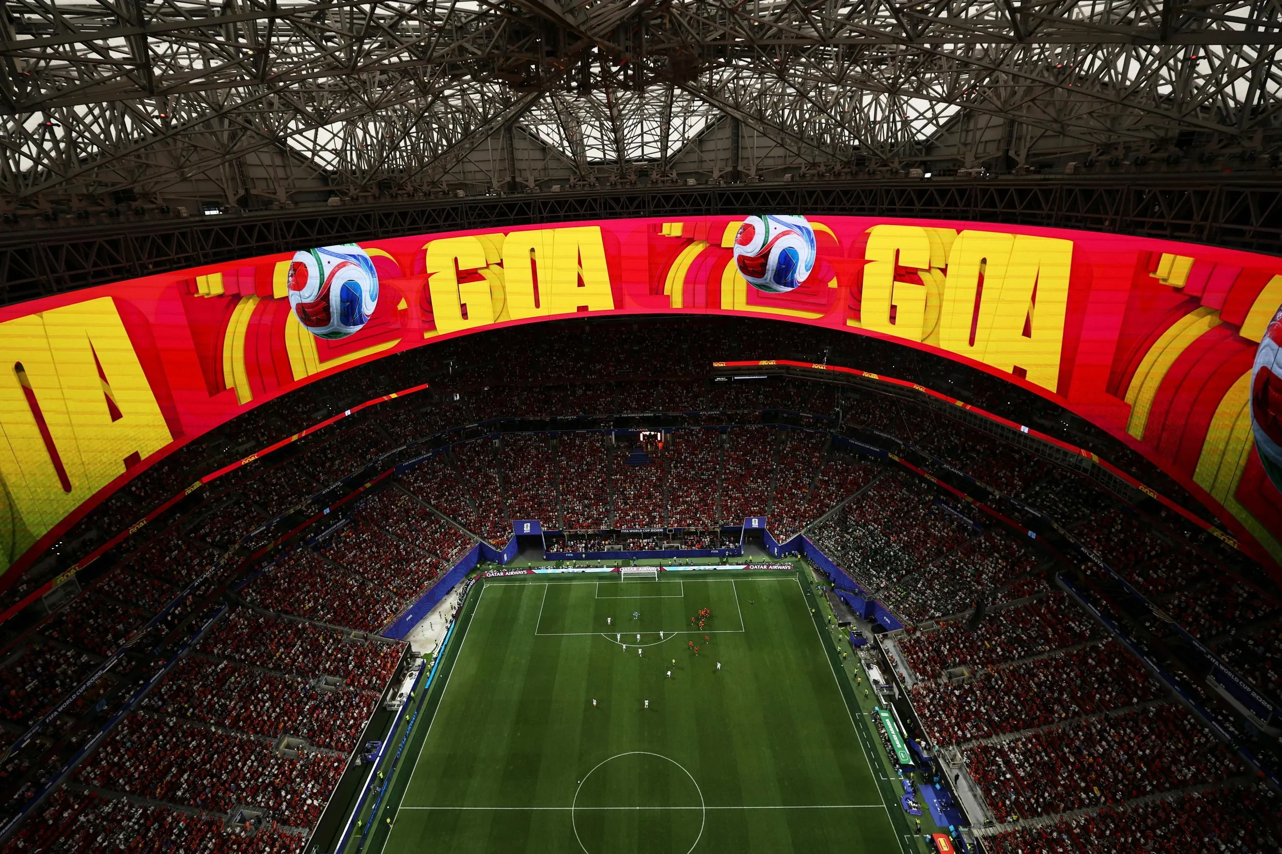 A giant video screen hails a goal for Spain aganist Saudi Arabia in Atlanta.