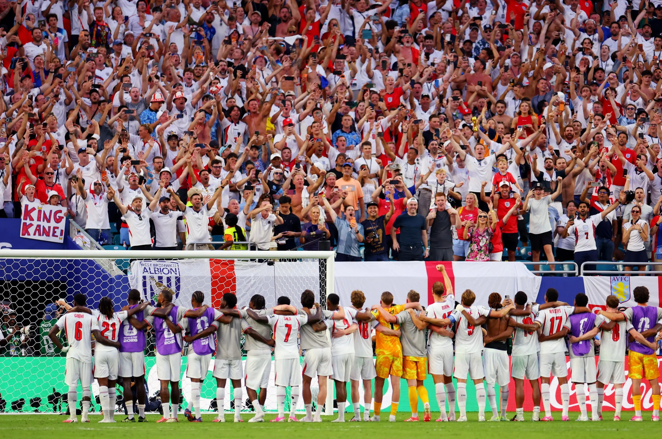 England line up in front of their fans after the match