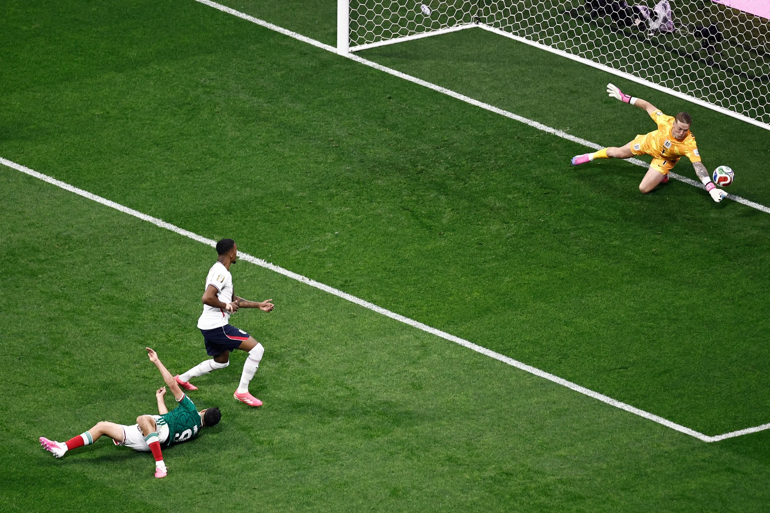 Jordan Pickford makes a fine early save from a Raúl Jiménez header.