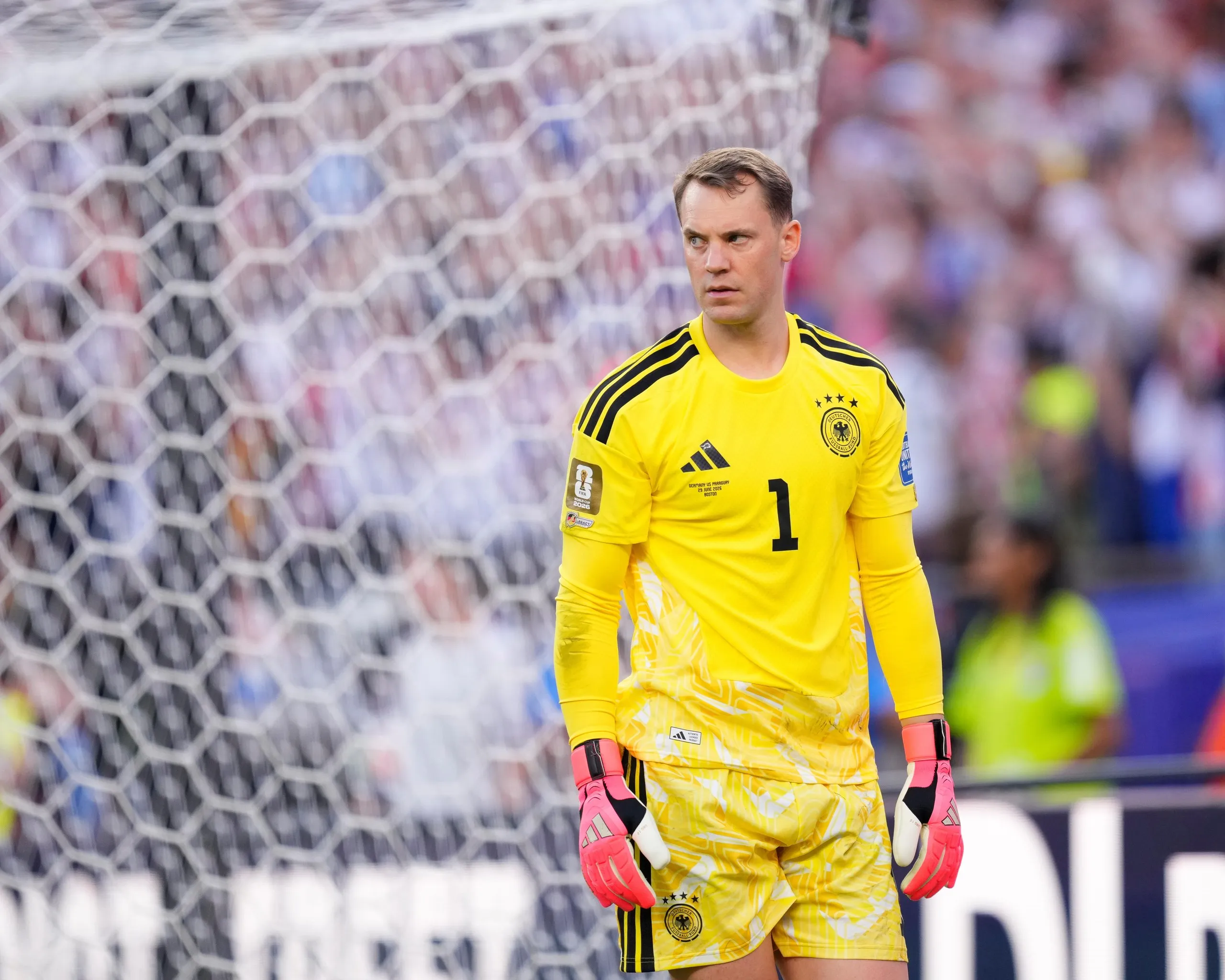 The Germany goalkeeper Manuel Neuer stands looking disappointed as his team lose on penalties to Paraguay in the last 32 of the 2026 World Cup.