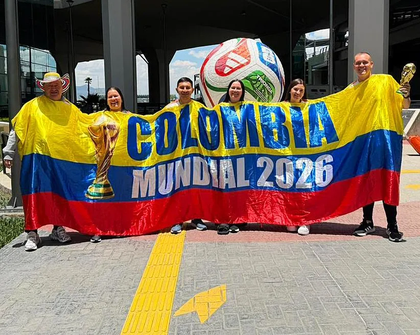 The Mila family and their six-metre long flag.